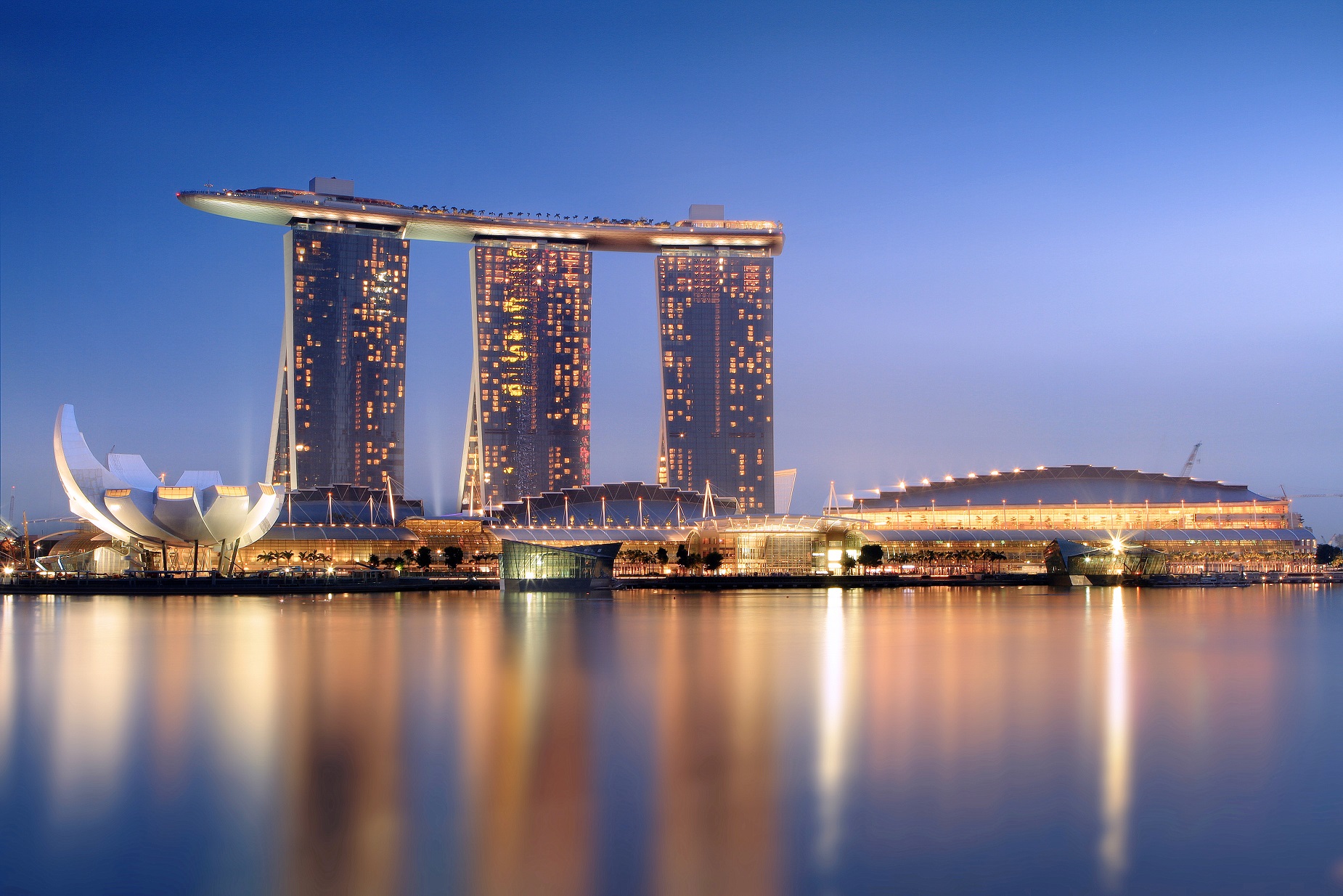 Singapore skyline at sunset from Gardens by the Bay East